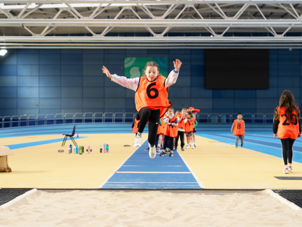 kid jumping at camp
